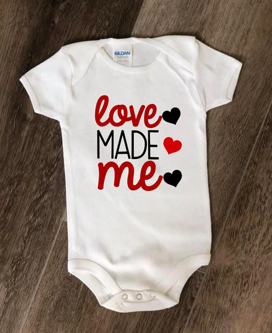 Love Made Me Baby Bodysuit